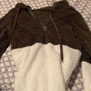 Green and white half zip up sweater